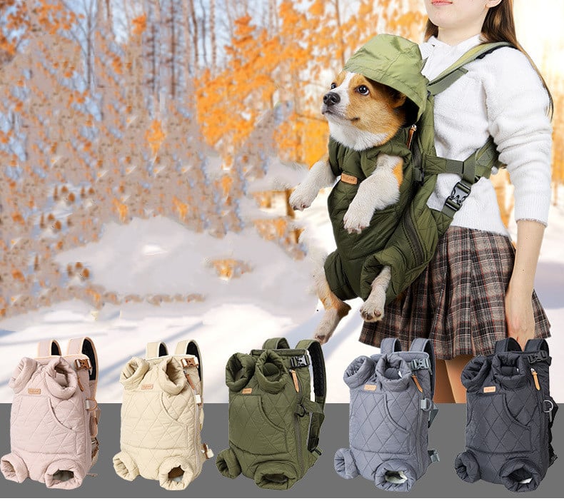 Front-Carry Pet Sling – dog in a green backpack carrier with a person in a forest setting