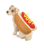 Food-Themed Pet Costume – dog wearing a hot dog costume with mustard on a white background