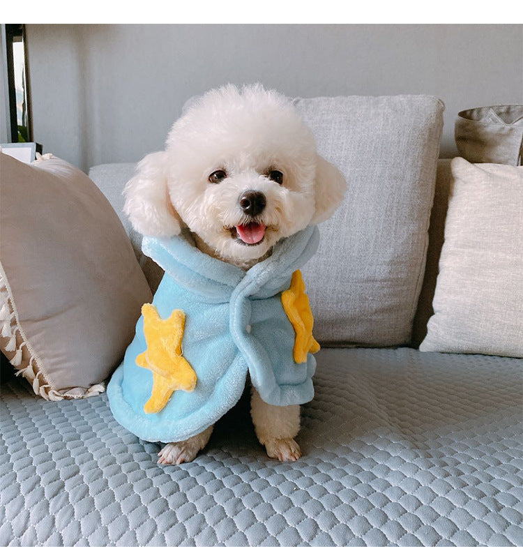Star Print Pet Nightgown – white dog wearing a blue outfit with yellow stars on a couch