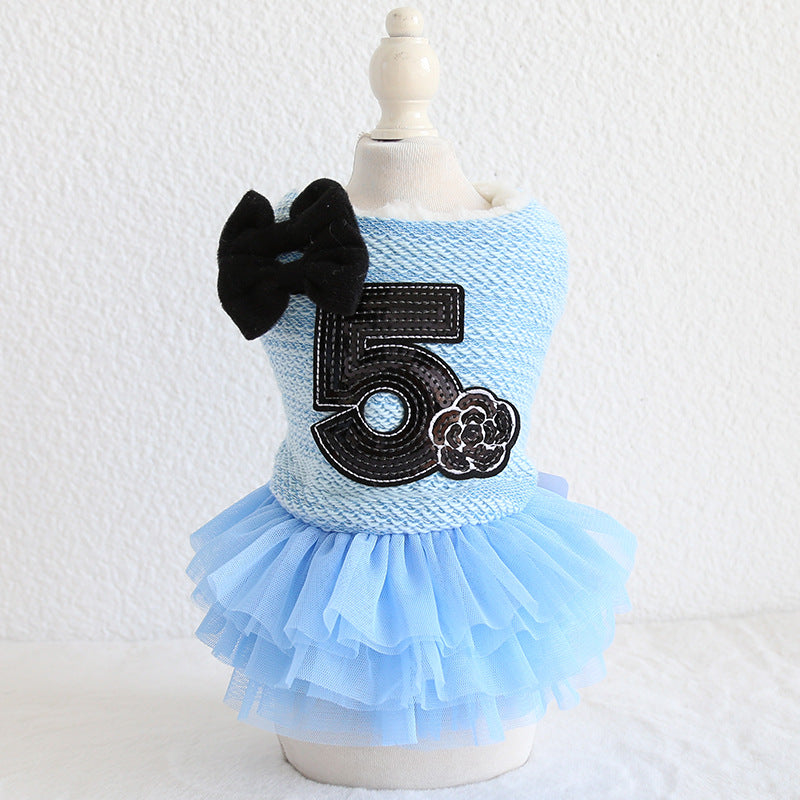 Double-Bow Dog Dress – light blue pet dress with black number 5 and bow on a mannequin, product photo