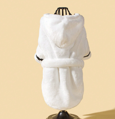 White Hooded Dog Bathrobe – white plush hooded garment on a mannequin against a beige background