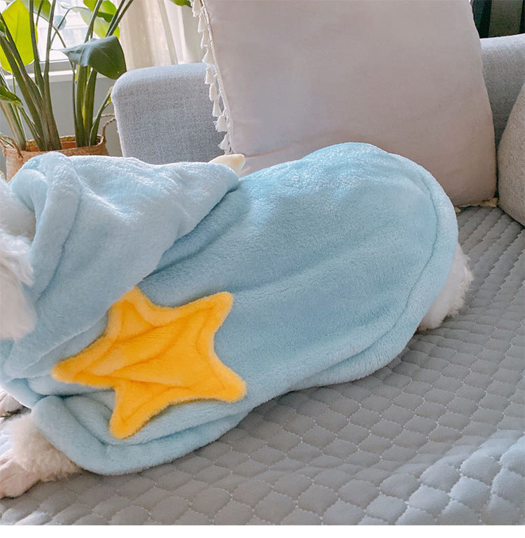 Star Print Pet Nightgown – light blue blanket with a yellow star on a gray couch
