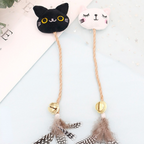 Feather & Bell Cat Toy – cat-shaped toy with feathers and bells on a light background